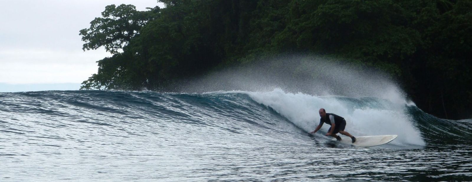 Carl McIntyre surfing, the founder of AED NZ